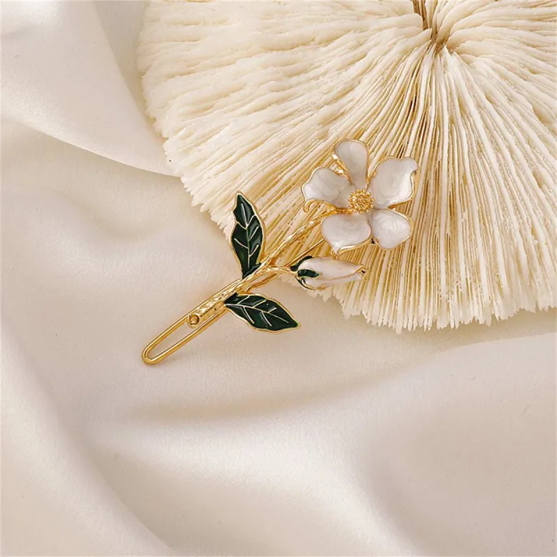 Green Enamel & Goldtone Flower Hair Clip made by Zulily