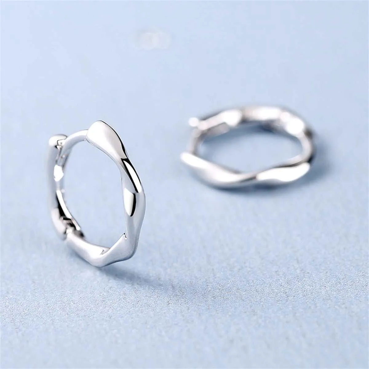 Silvertone Wave Huggie Earring sold by Zulily product image thumbnail 2