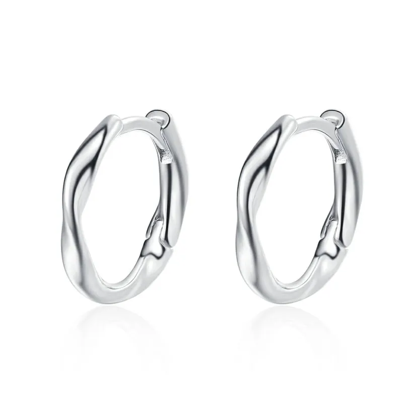 Silvertone Wave Huggie Earring made by Zulily