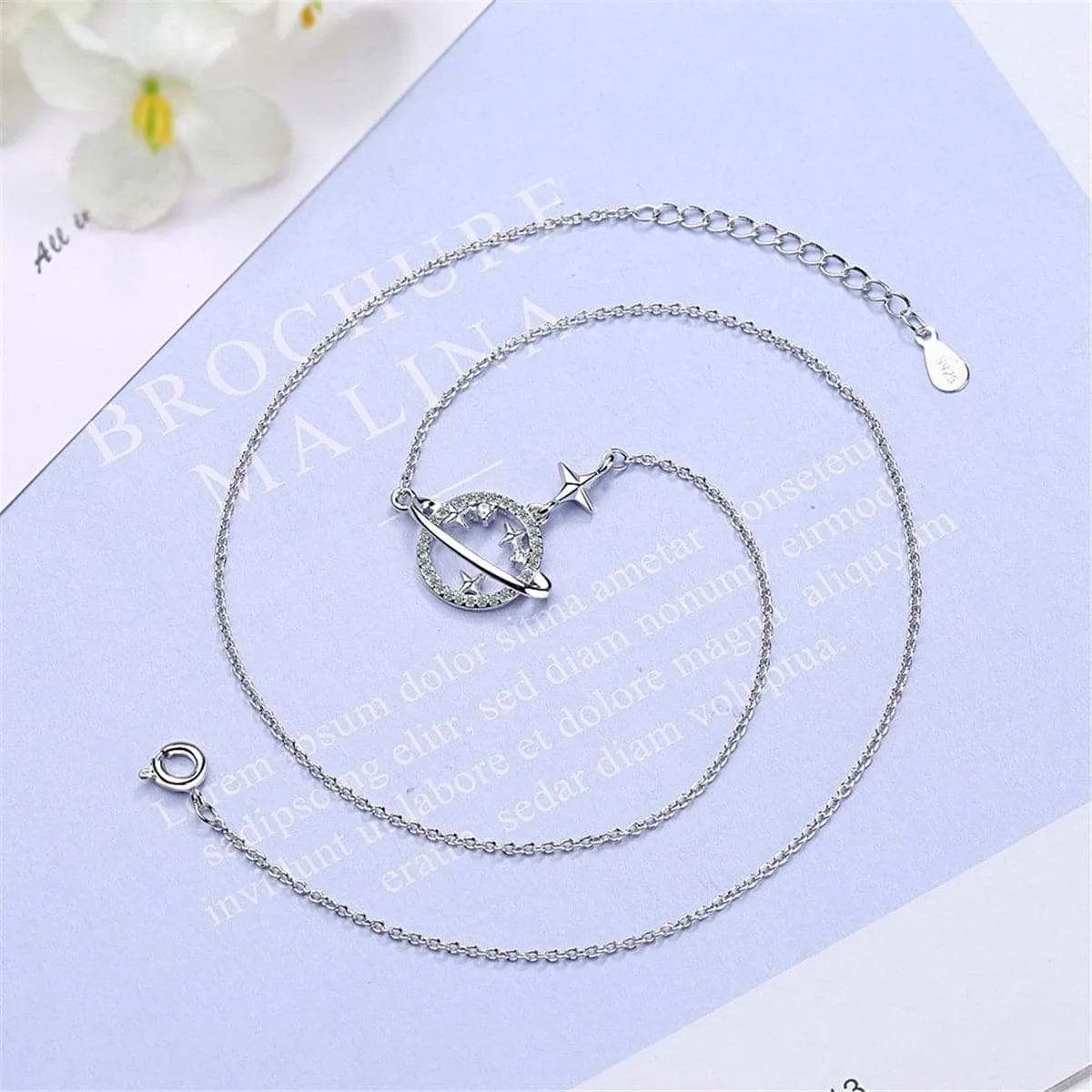 Cubic Zirconia & Silvertone Planet Pendant Necklace sold by Zulily