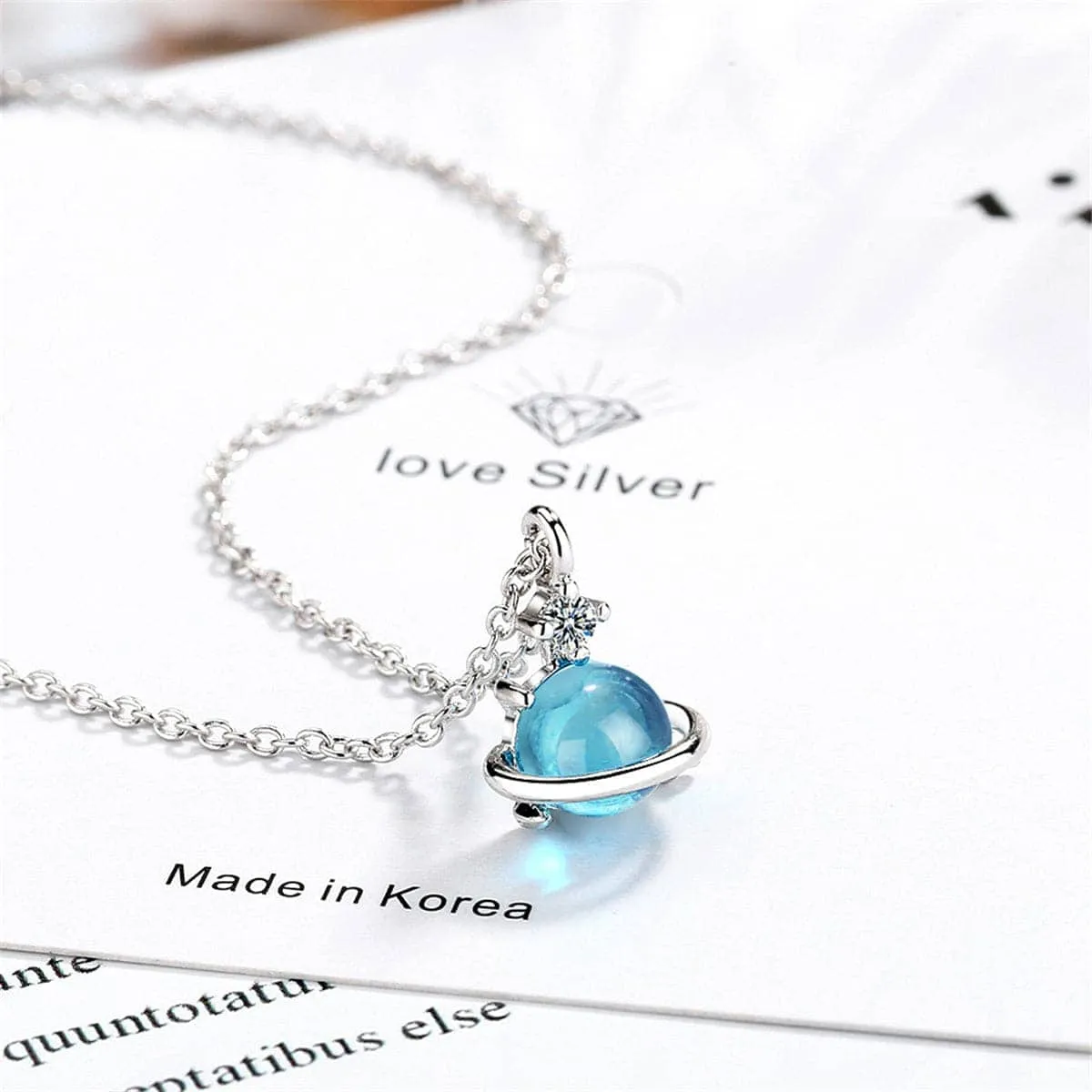 Blue Crystal & Cubic Zirconia Planet Pendant Necklace sold by Zulily