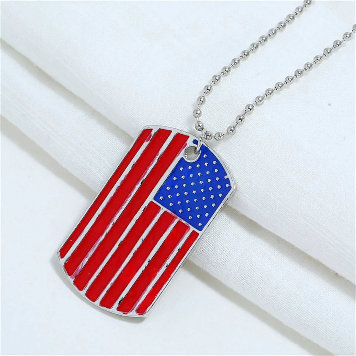 Red & Blue Enamel Stars & Stripes Dog Tag Pendant Necklace sold by Zulily