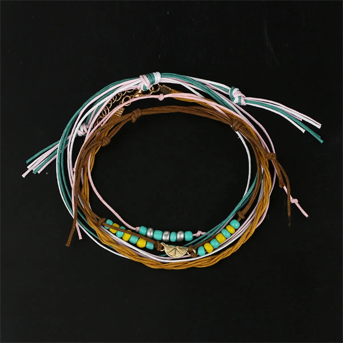 Turquoise & Yellow Multi-Strand Anklet Set sold by Zulily