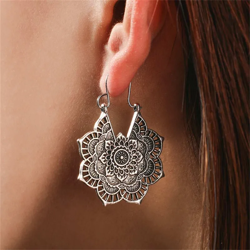 Silvertone Floral Huggie Earrings made by Zulily