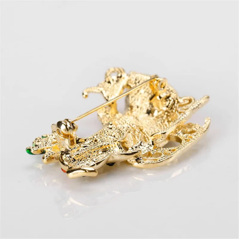Cubic Zirconia & Goldtone Deer & Sled Brooch made by Zulily