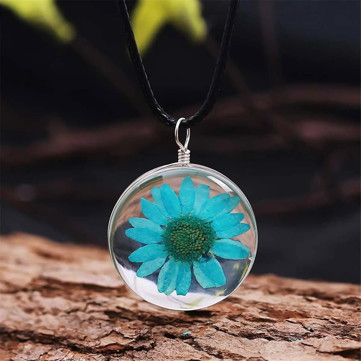 Lake Blue Daisy Pendant Necklace sold by Zulily