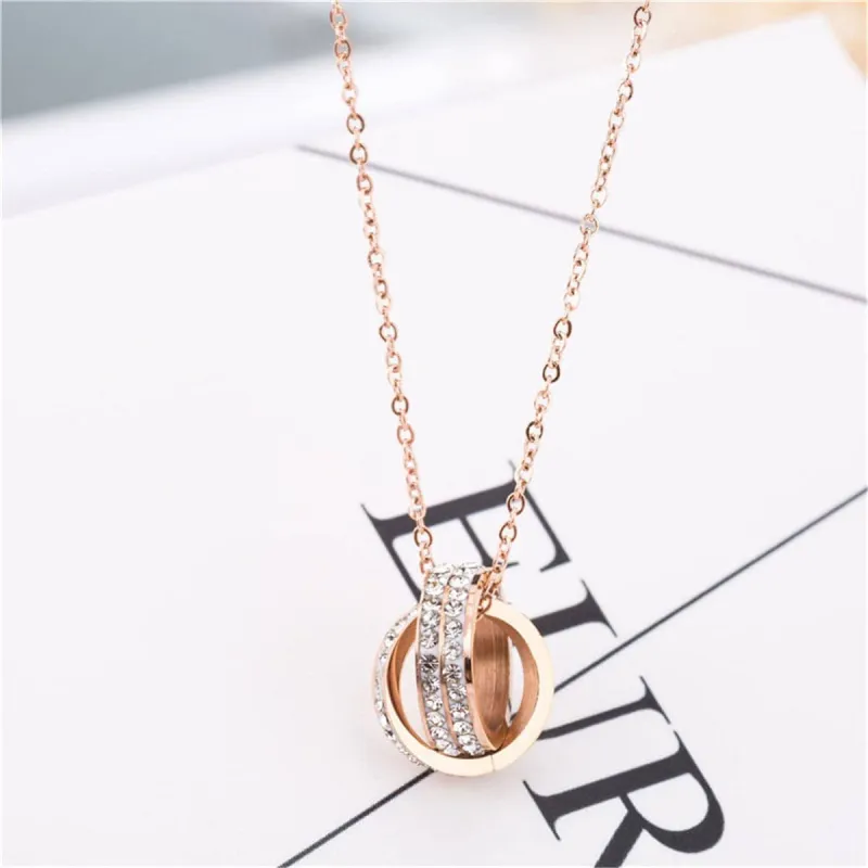 Cubic Zirconia & Rose Goldtone Crossed Ring Pendant Necklace made by Zulily