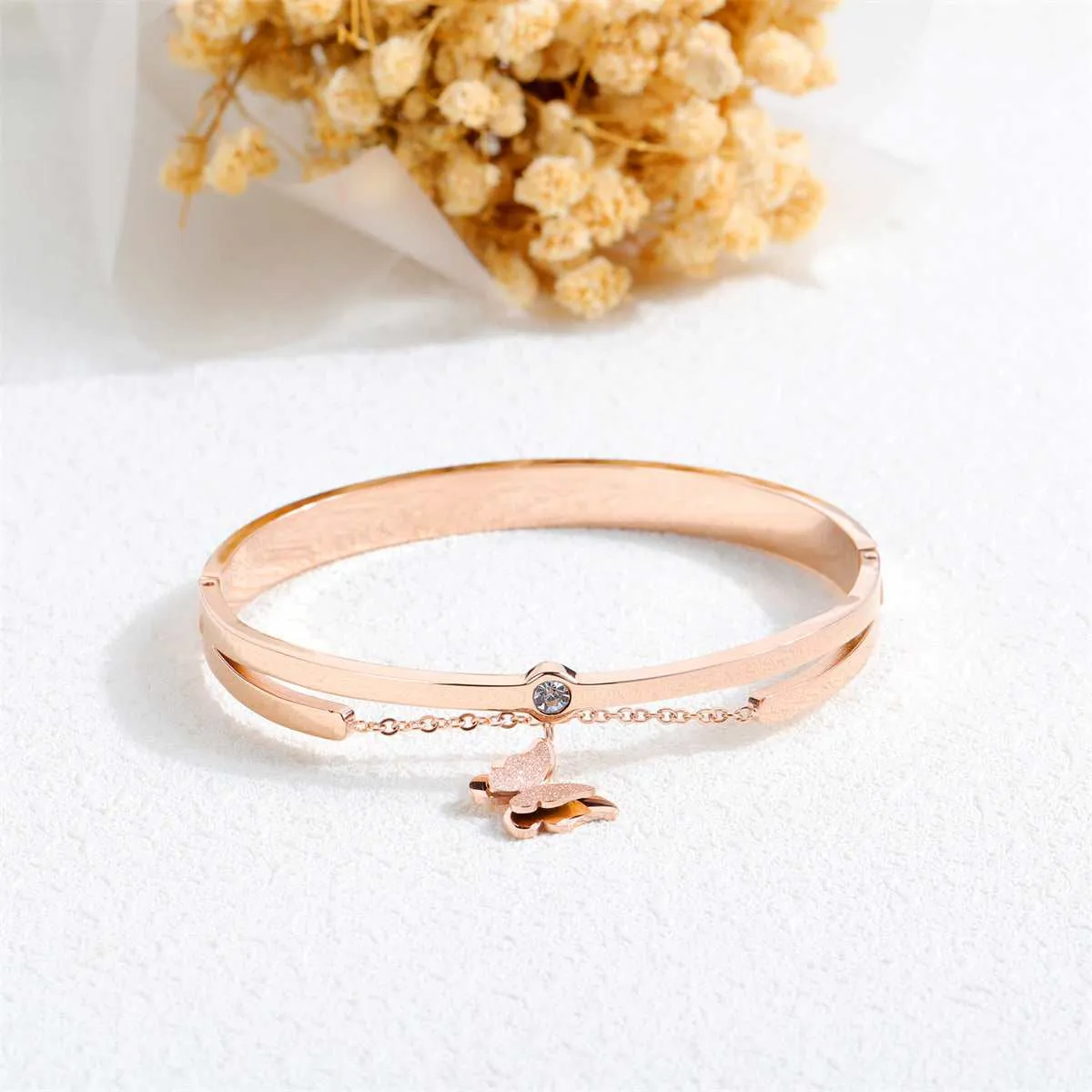 Cubic Zirconia & Rose Goldtone Frosted Butterfly Bangle sold by Zulily product image thumbnail 4