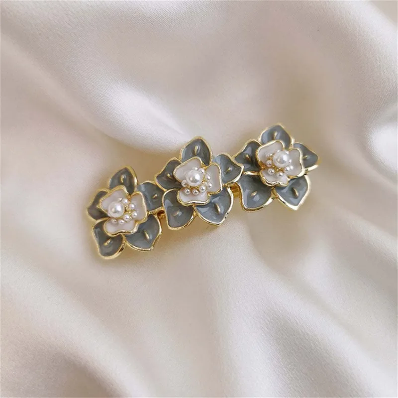 Pearl & Enamel Goldtone Flower Trio Hair Clip made by Zulily