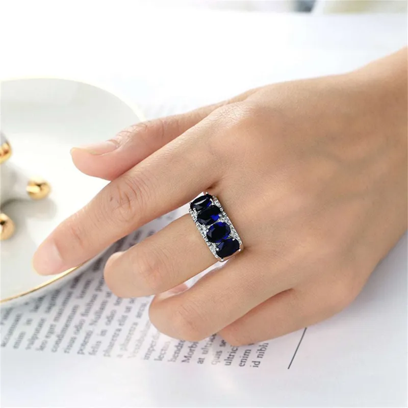 Navy Crystal & Silvertone Four-Stone Prong-Set Ring made by Zulily