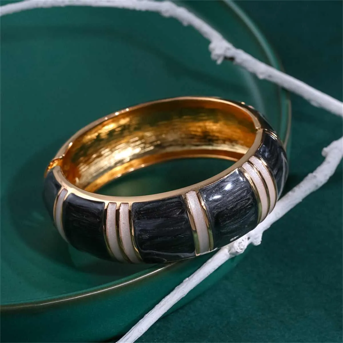 Black Enamel & Goldtone Bamboo Bangle sold by Zulily product image thumbnail 3