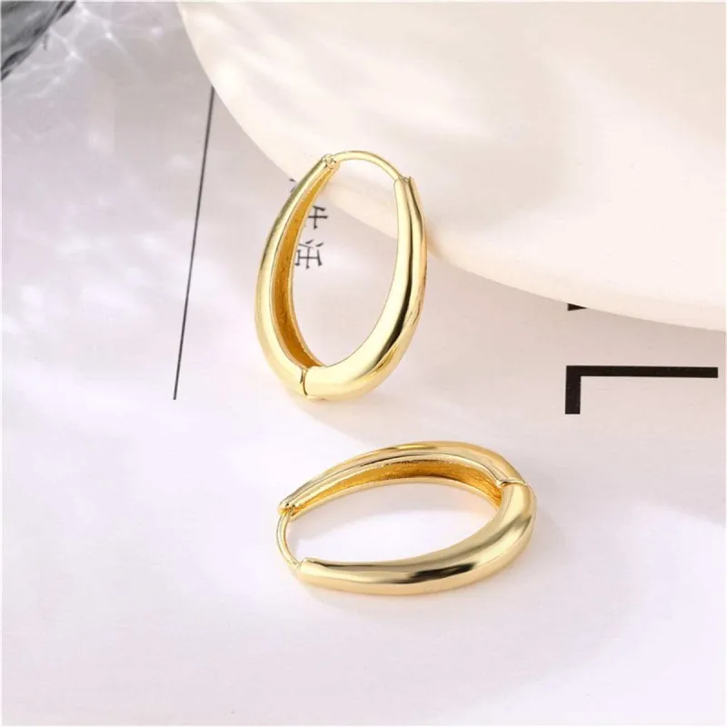 Goldtone Ellipse Huggie Earrings made by Zulily