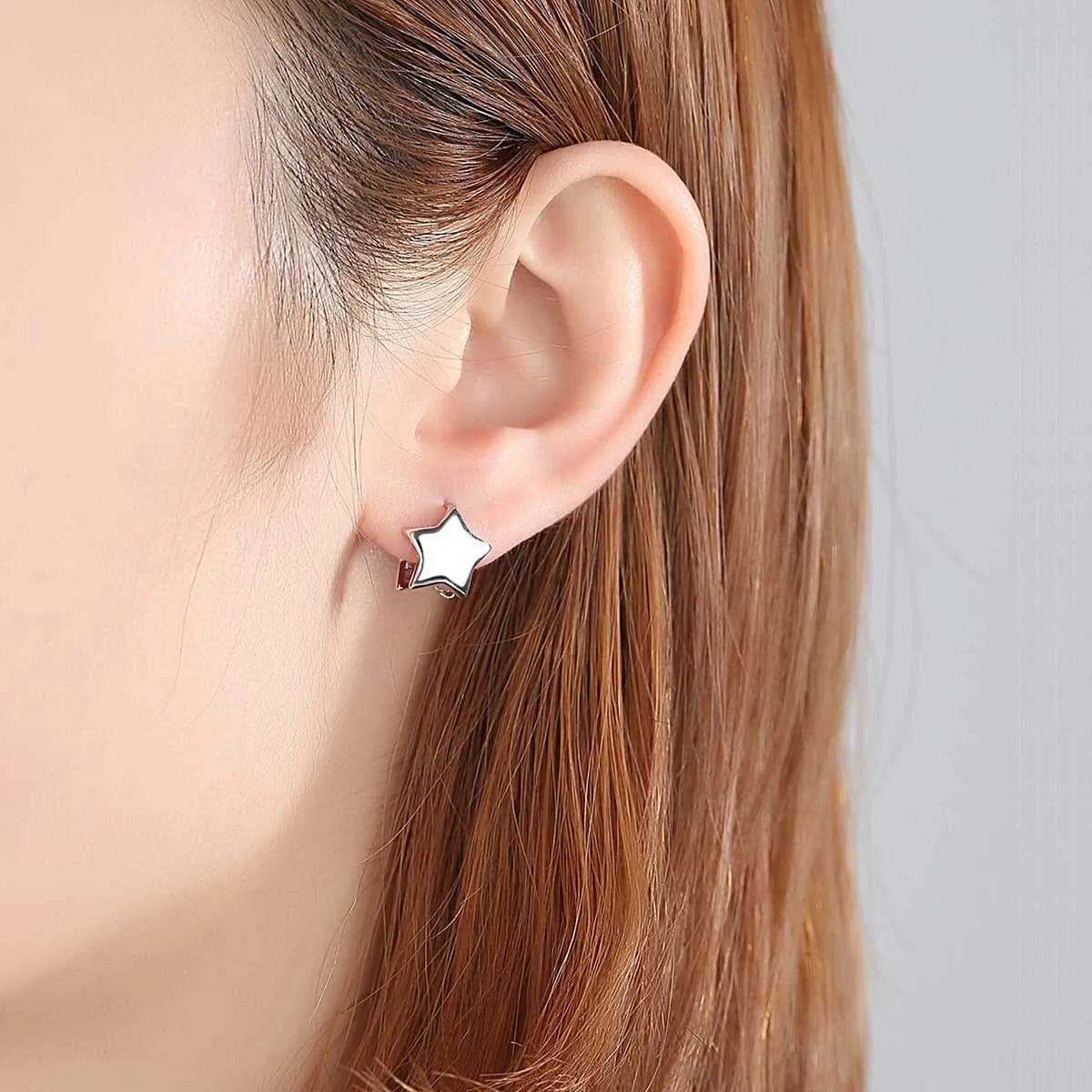 Silvertone Star Huggie Earrings sold by Zulily product image thumbnail 3