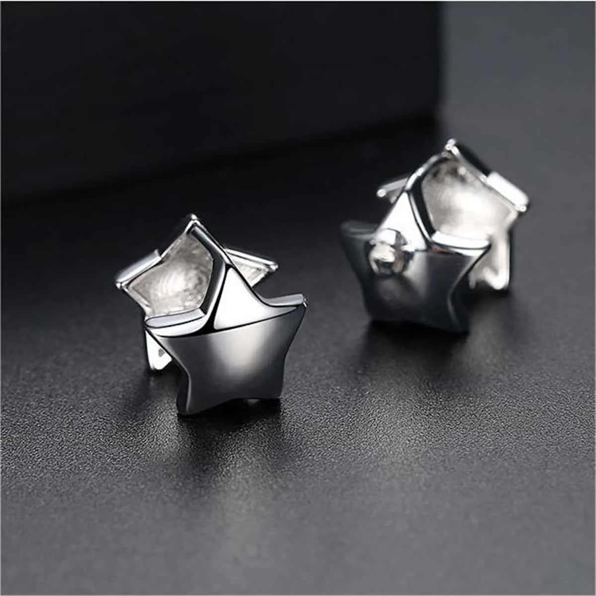Silvertone Star Huggie Earrings sold by Zulily product image thumbnail 2