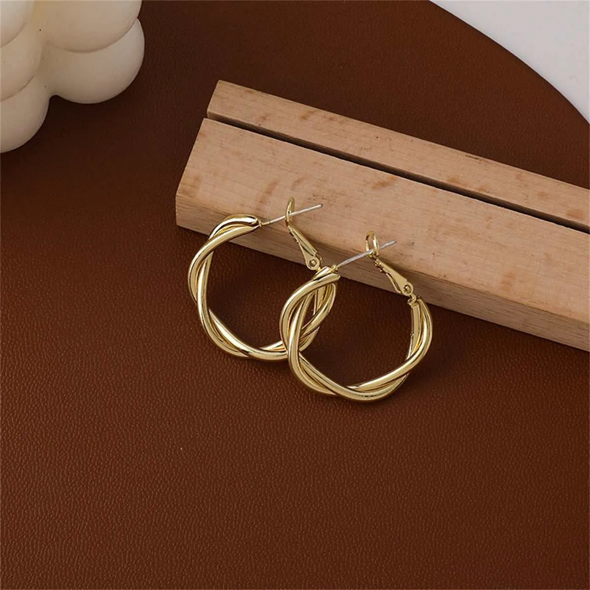 Goldtone Twine Hoop Earrings sold by Zulily