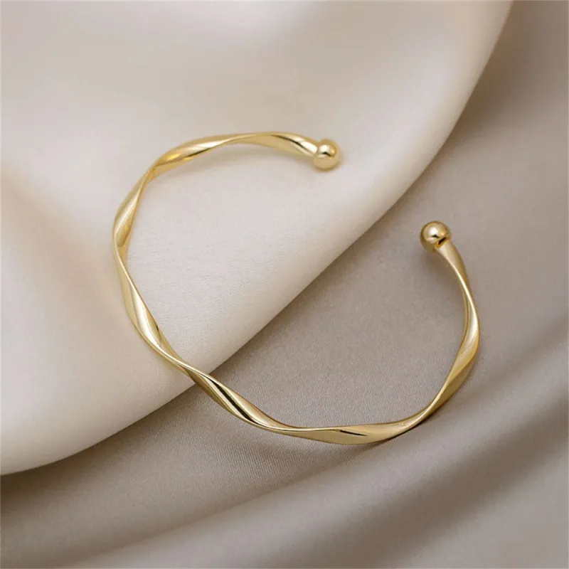 Goldtone Curved Waves Cuff made by Zulily
