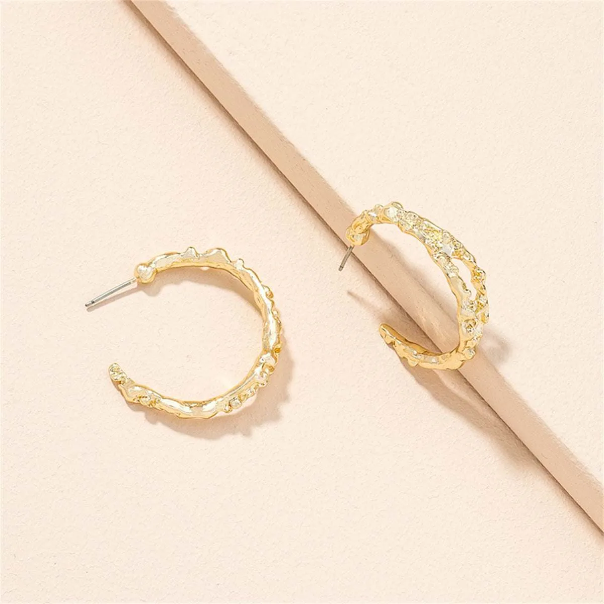 Goldtone Huggie Earrings sold by Zulily