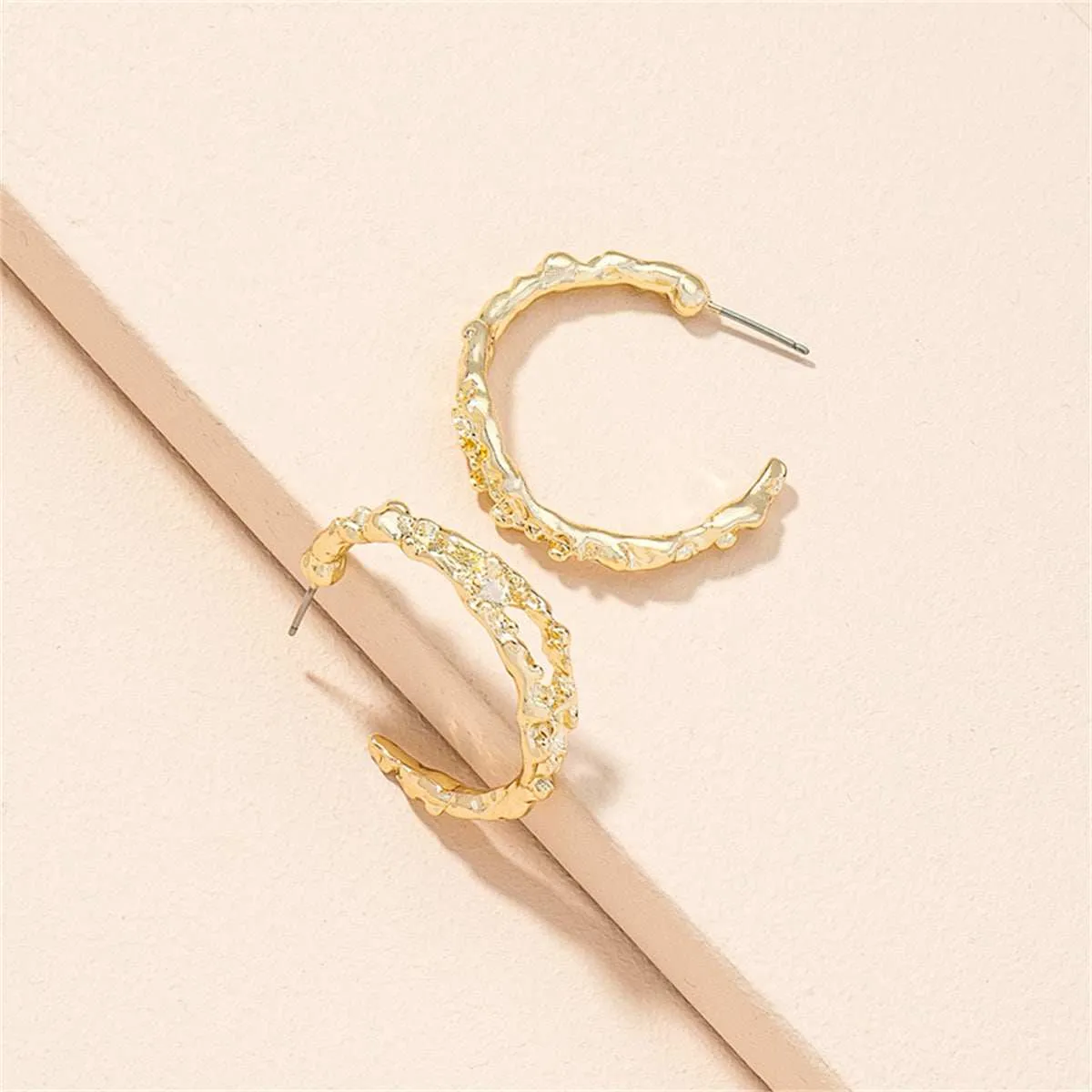 Goldtone Huggie Earrings sold by Zulily product image thumbnail 3