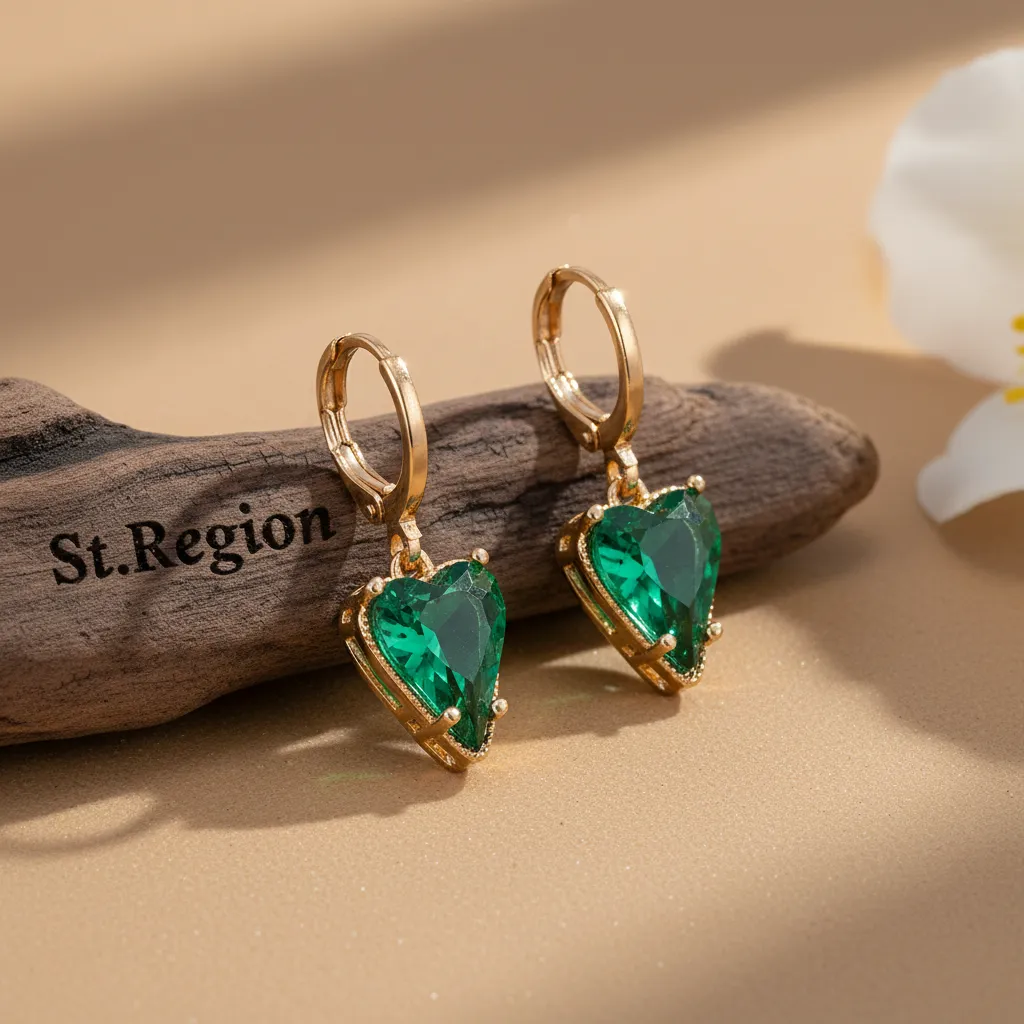 Emerald Crystal & Goldtone Heart Huggie Earrings sold by Zulily