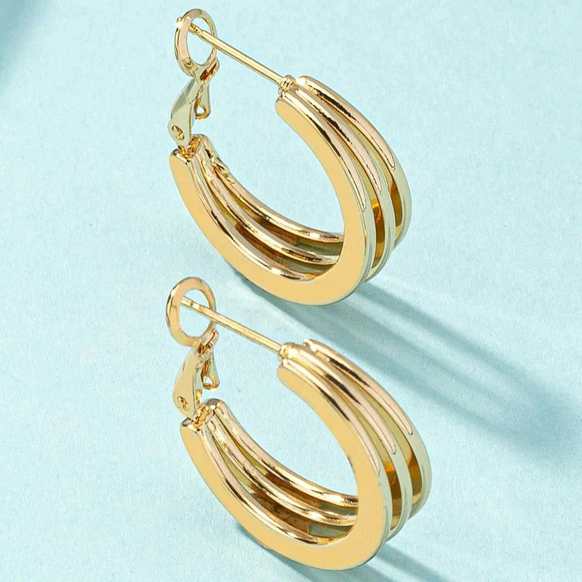 Goldtone Layered Huggie Earrings sold by Zulily product image thumbnail 3