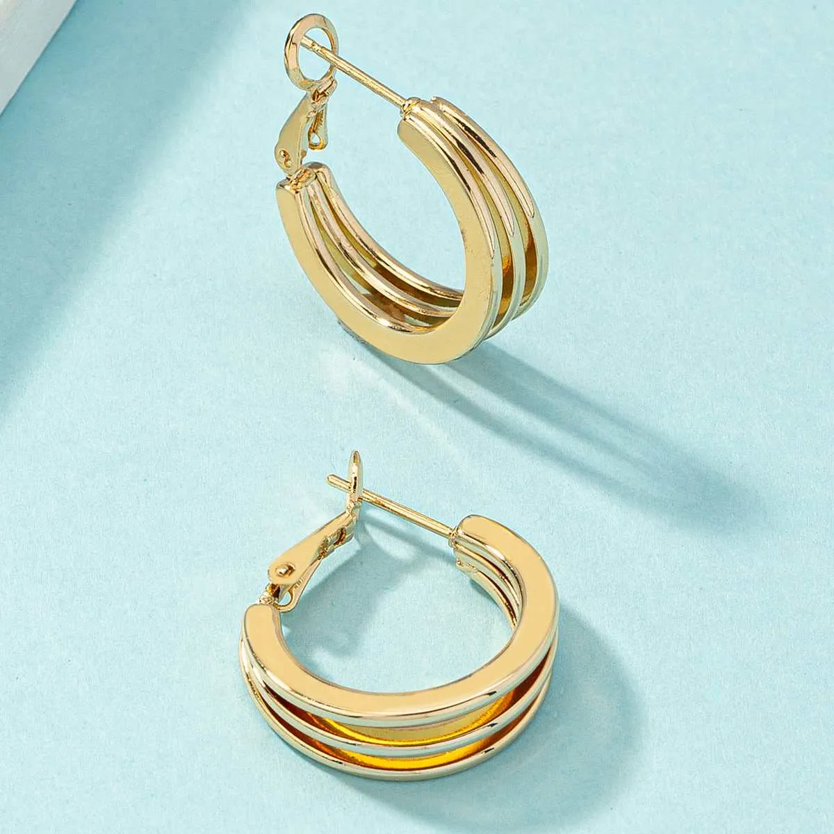 Goldtone Layered Huggie Earrings sold by Zulily