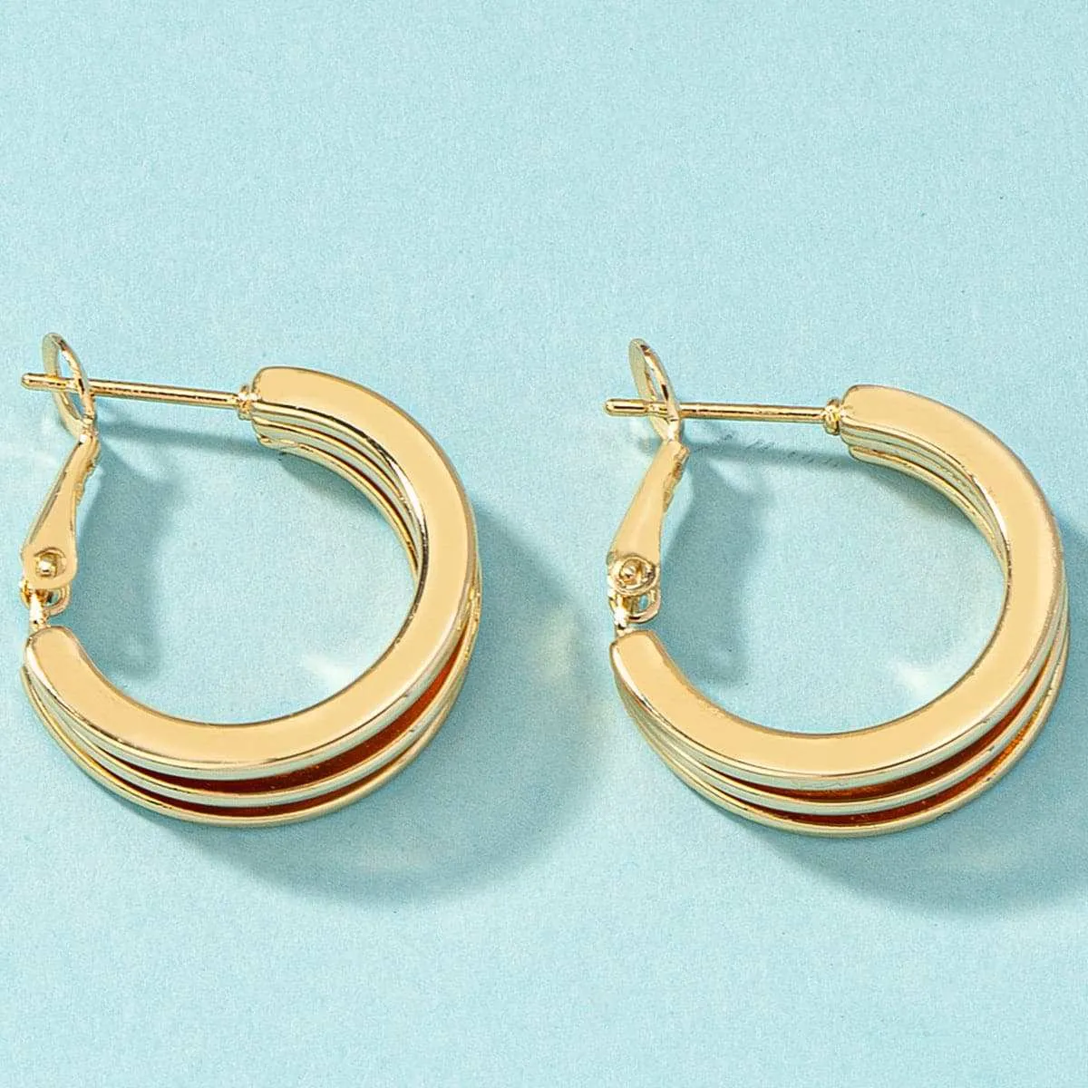 Goldtone Layered Huggie Earrings sold by Zulily product image thumbnail 2