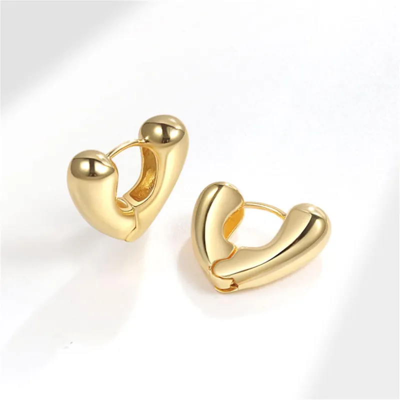 Goldtone Heart Huggie Earrings made by Zulily
