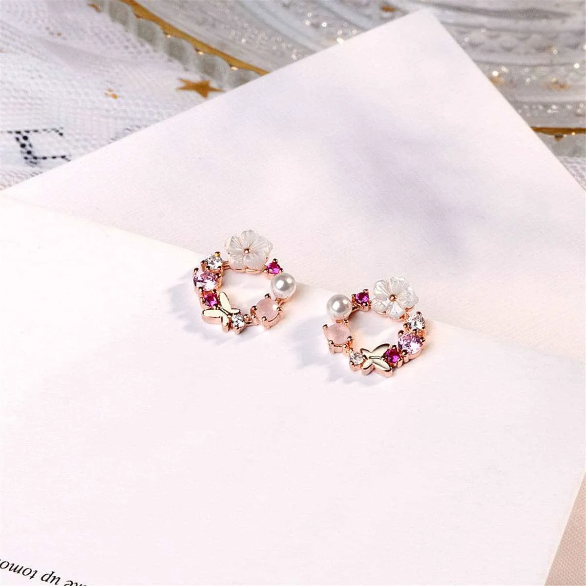Opal & Cubic Zirconia Butterfly & Floral Stud Earrings sold by Zulily
