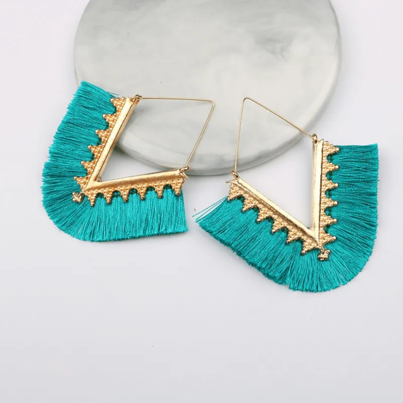 Goldtone Turquoise Tassel Triangle Drop Earrings made by Zulily