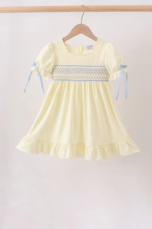 Cream smocked ruffle dress made by Zulily