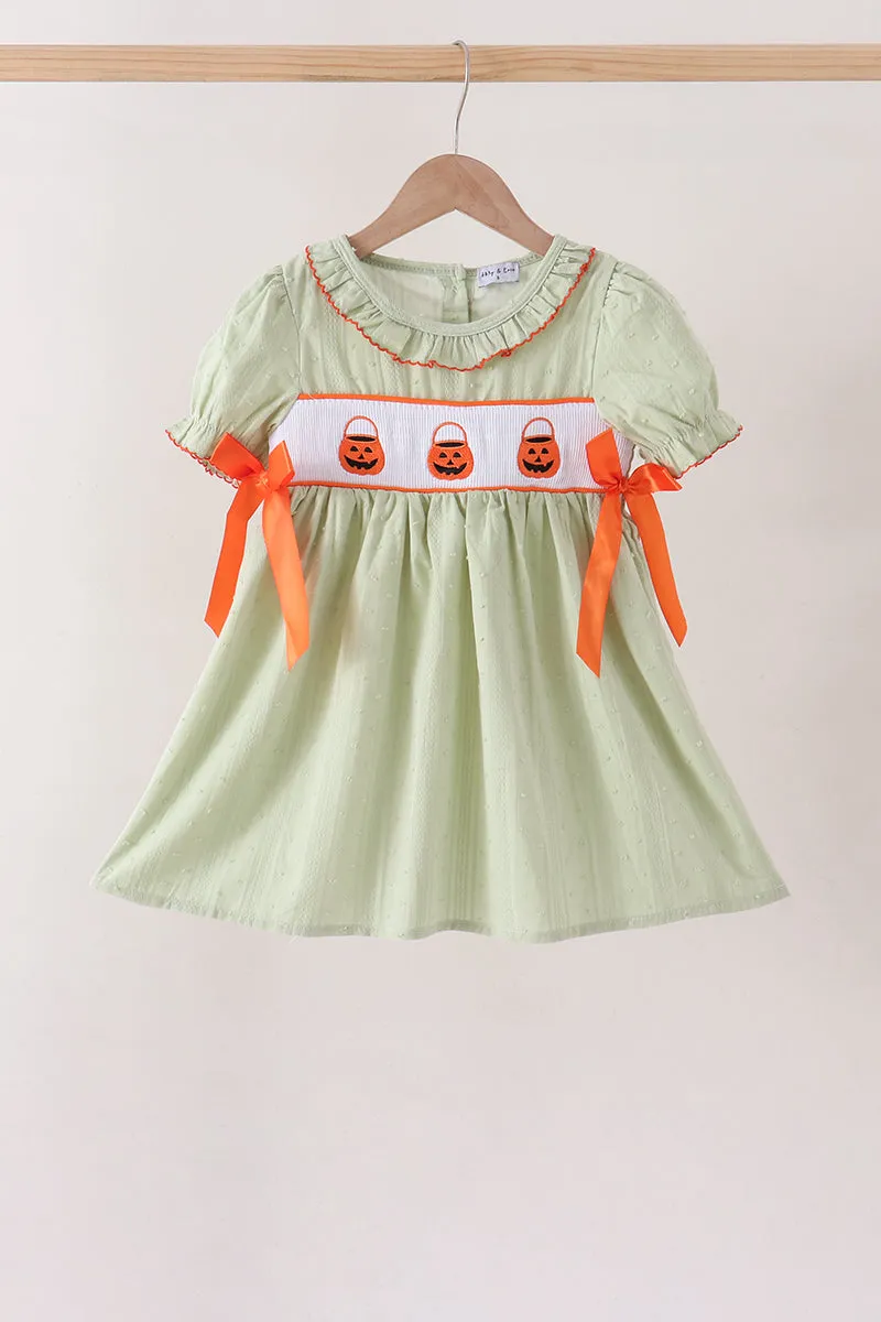 Green Pumpkin Smocked Dress sold by Zulily