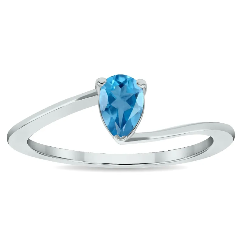 Women's Solitaire Blue Topaz Wave Ring in 10K White Gold sold by Zulily