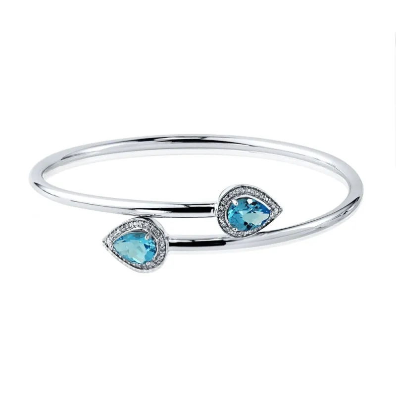 Auriya 2 1/2ct Pear-Shaped Swiss-Blue Topaz Gold over Silver Bangle Bracelet with Diamond Accents sold by Zulily