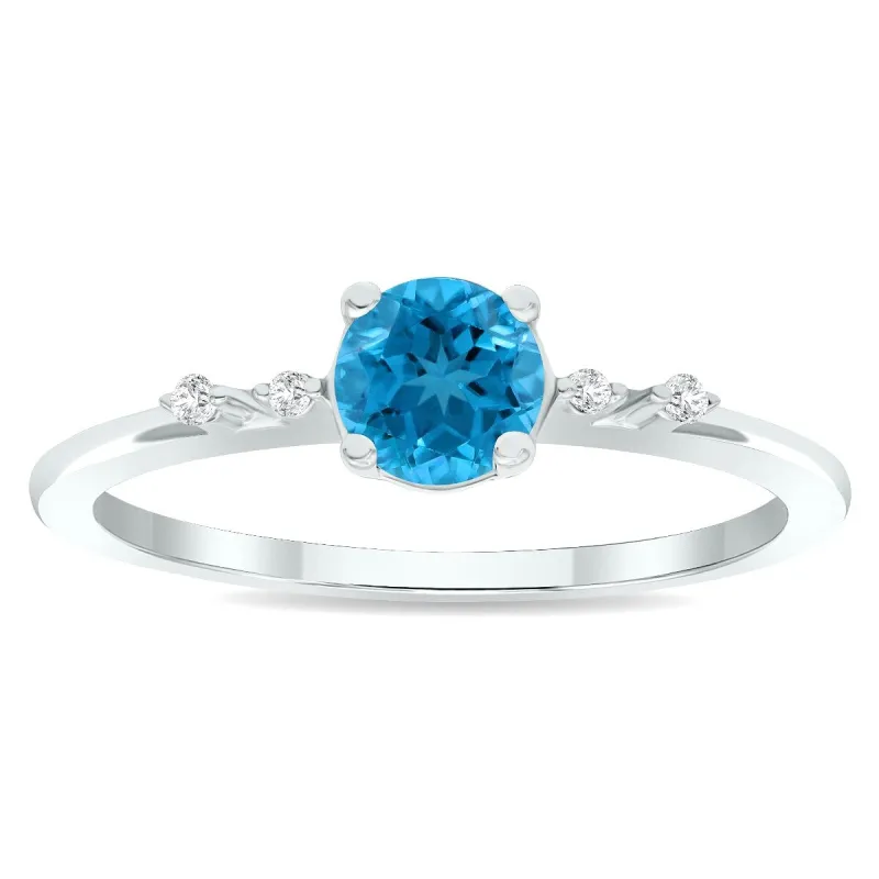 Women's Blue Topaz and Diamond Sparkle Ring in 10K White Gold sold by Zulily