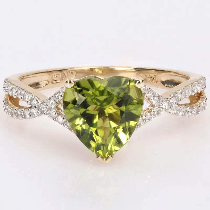 Miadora Heart-cut Peridot and 1/5ct TDW Diamond Crossover Ring in 14k Yellow Gold sold by Zulily