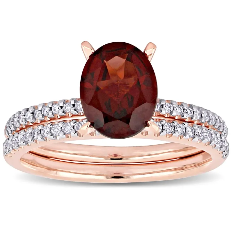 Miadora 14k Rose Gold Oval-cut Garnet and 1/4ct TDW Diamond Solitaire Bridal Ring Set sold by Zulily