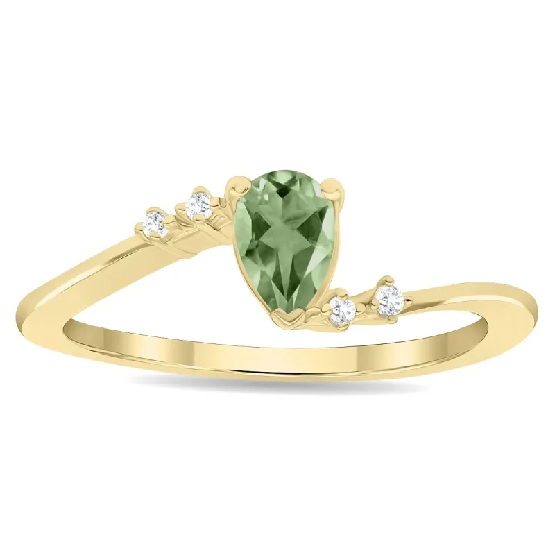 Women's Pear Shaped Green Amethyst and Diamond Wave Ring in 10K Yellow Gold sold by Zulily