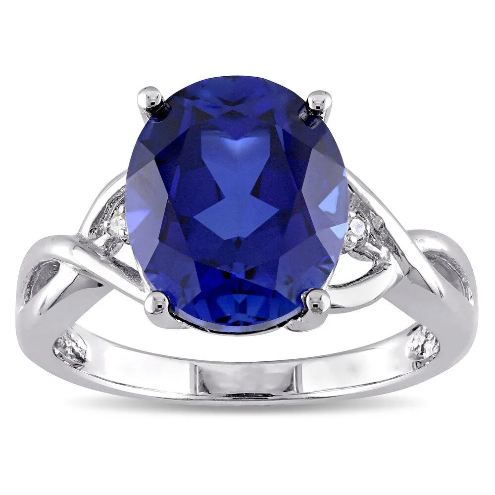 Miadora Sterling Silver Oval-Cut Created Blue Sapphire and Diamond Accent Crossover Ring sold by Zulily