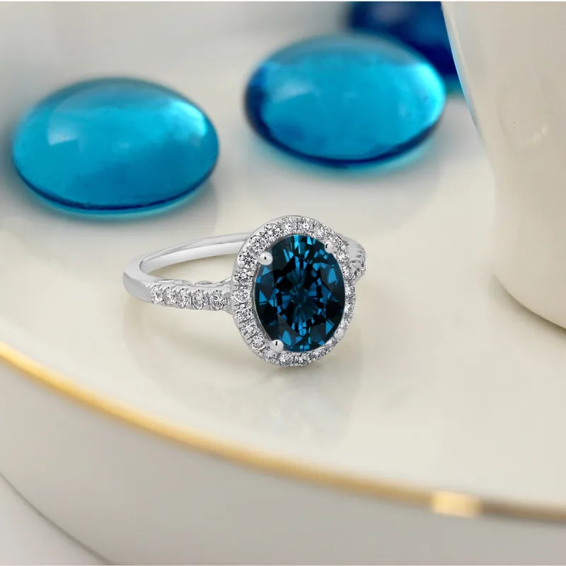 Auriya 3ct Oval London Blue Topaz and Halo Diamond Engagement Ring 3/8ctw 14k Gold sold by Zulily