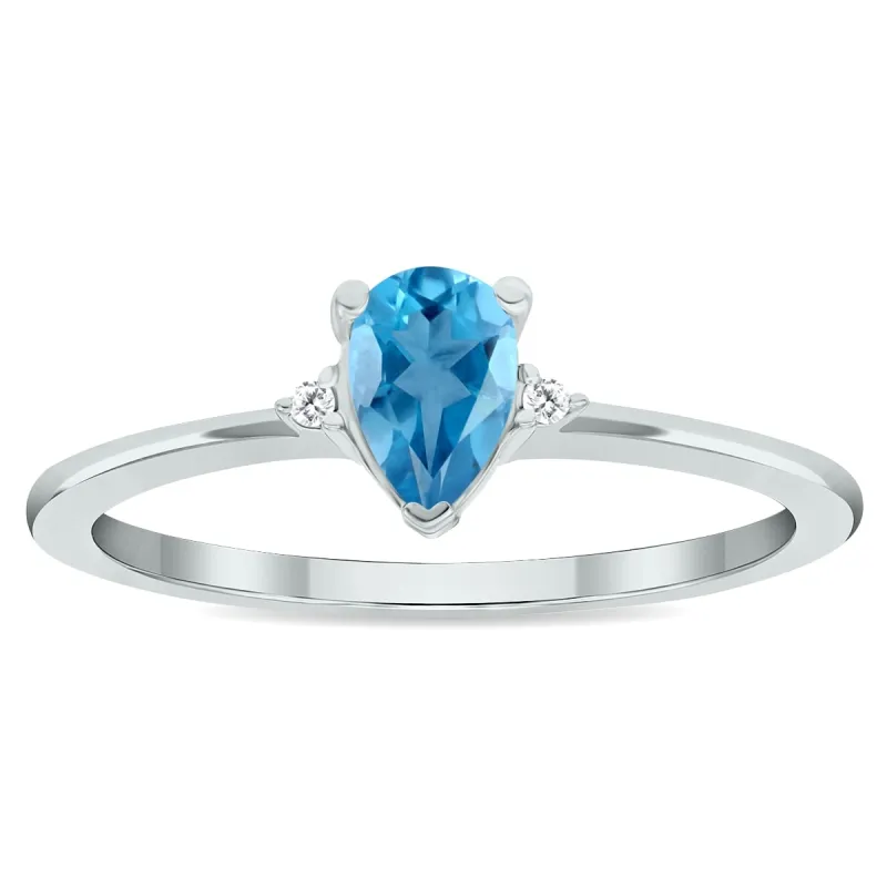 Women's Blue Topaz and Diamond Classic Band in 10K White Gold sold by Zulily