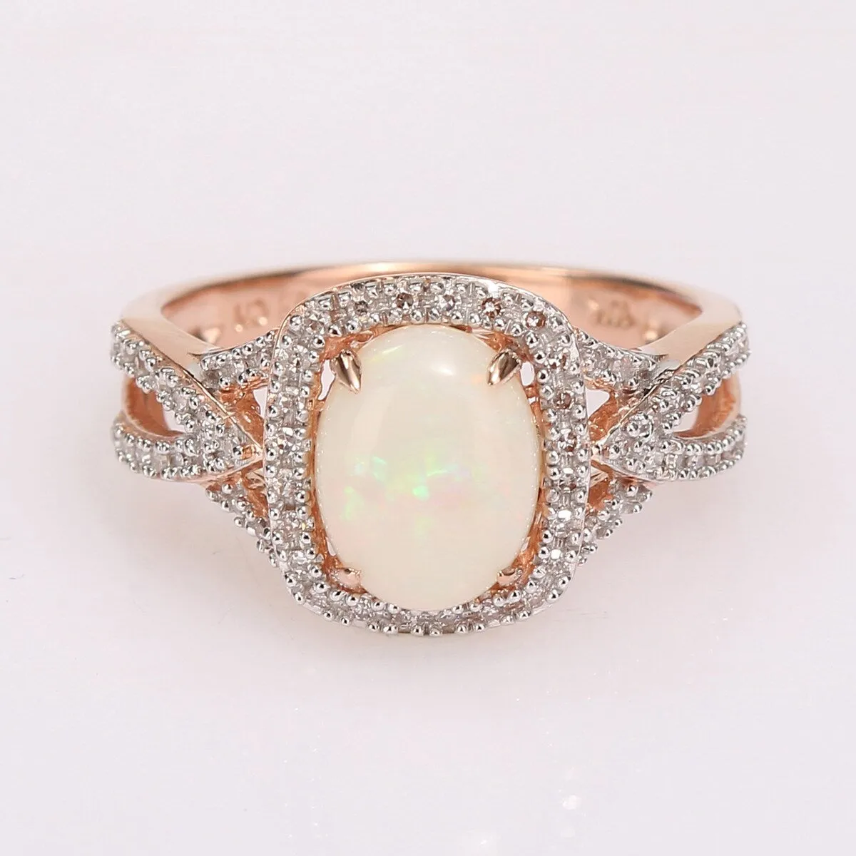 Miadora 10k Rose Gold Oval-cut Opal and 1/6ct TDW Diamond Halo Split Shank Engagement Ring sold by Zulily product image thumbnail 2
