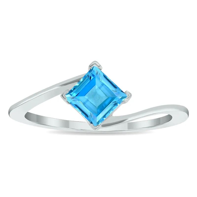 Women's Solitaire Blue Topaz Wave Ring in 10K White Gold sold by Zulily
