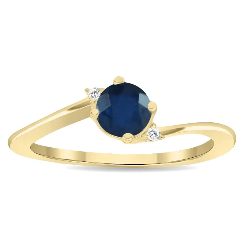 Women's Round Shaped Sapphire and Diamond Wave Ring in 10K Yellow Gold sold by Zulily