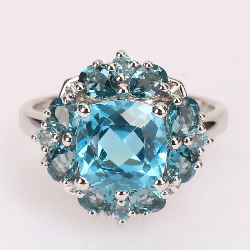 Miadora Sterling Silver 4 1/10ct TGW Swiss-Blue Topaz Floral Halo Cocktail Ring sold by Zulily