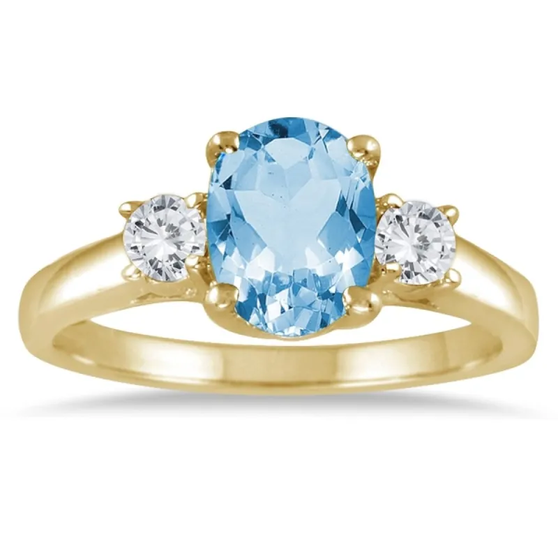 1 3/4 Carat Blue Topaz and Diamond Three Stone Ring 14K Yellow Gold sold by Zulily