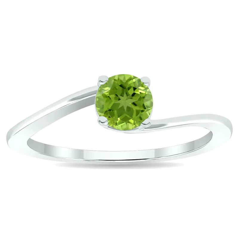 Women's Solitaire Peridot Wave Ring in 10K White Gold sold by Zulily