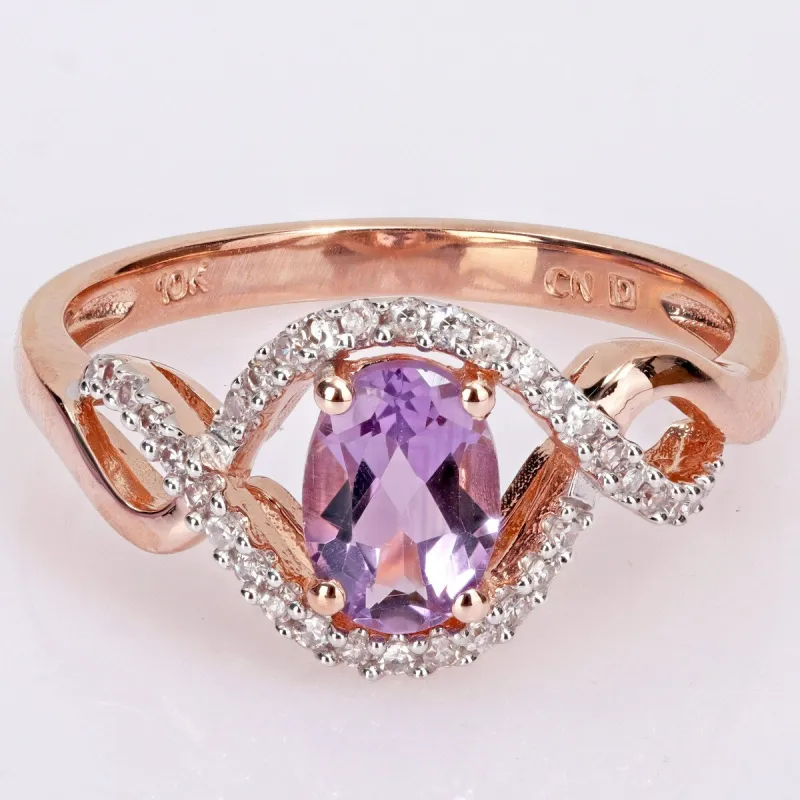 Miadora 10k Rose Gold Amethyst and 1/6ct TDW Diamond Halo Infinity Ring sold by Zulily