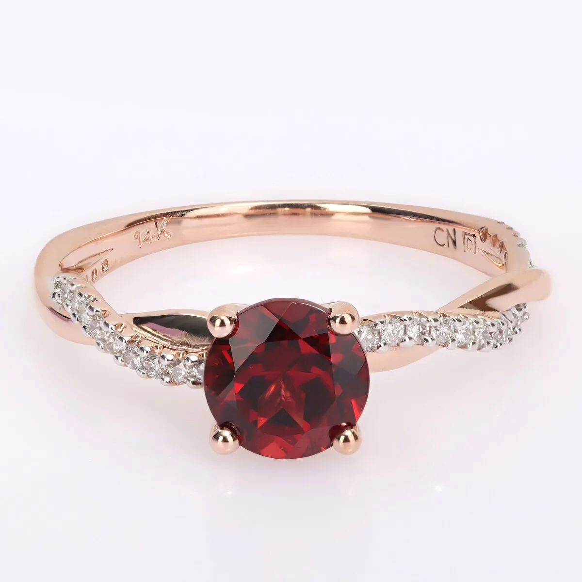 Miadora Garnet and 1/6ct TDW Diamond Crossover Birthstone Ring in 14k Rose Gold sold by Zulily