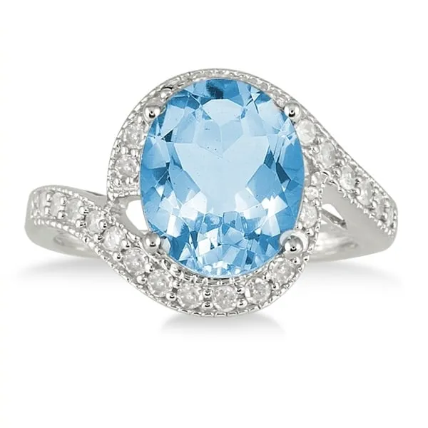 5 Carat Oval Blue Topaz and Diamond Ring in 10K White Gold sold by Zulily