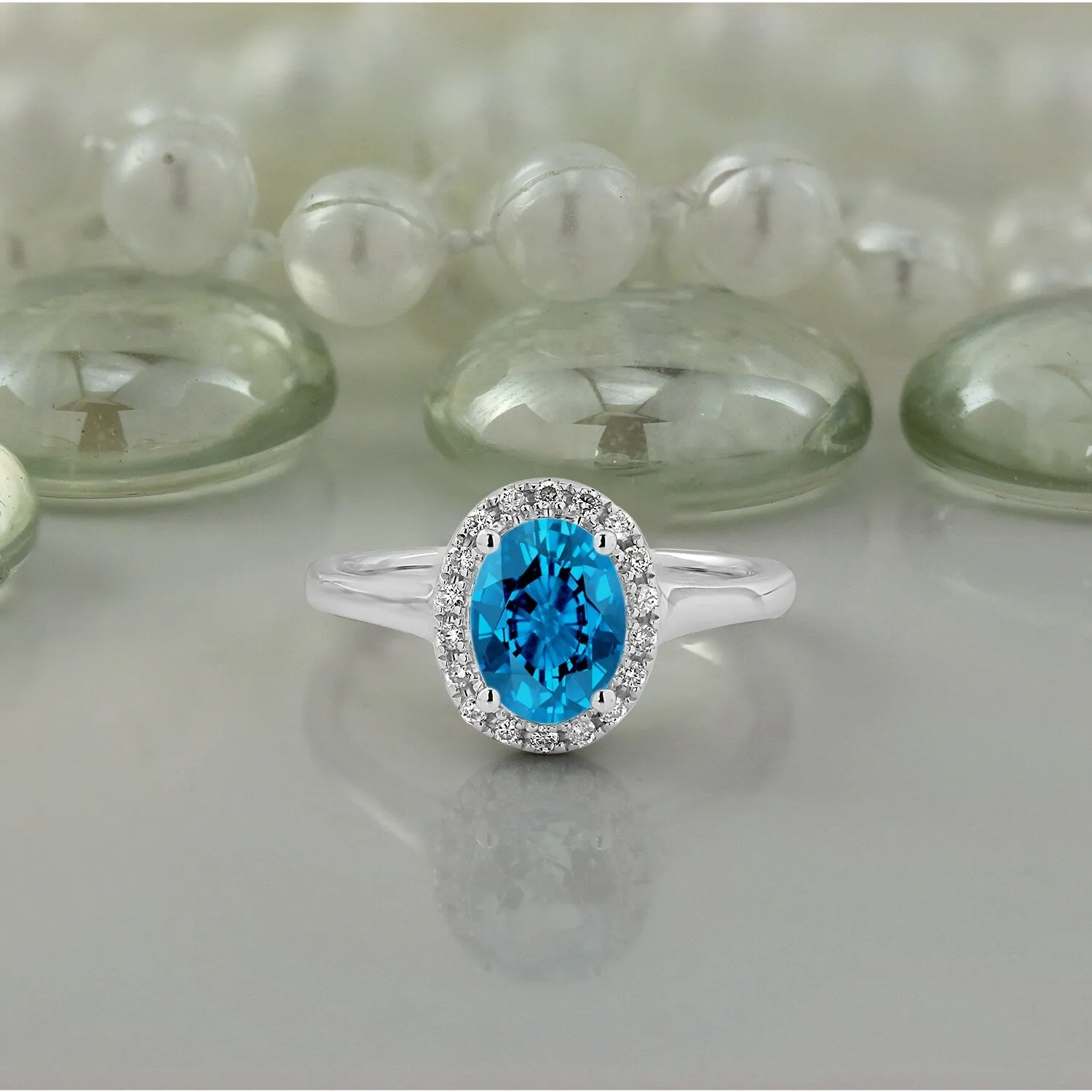Auriya Classic 1ct Oval Swiss Blue Topaz and Halo Diamond Engagement Ring 1/8cttw 14k Gold sold by Zulily